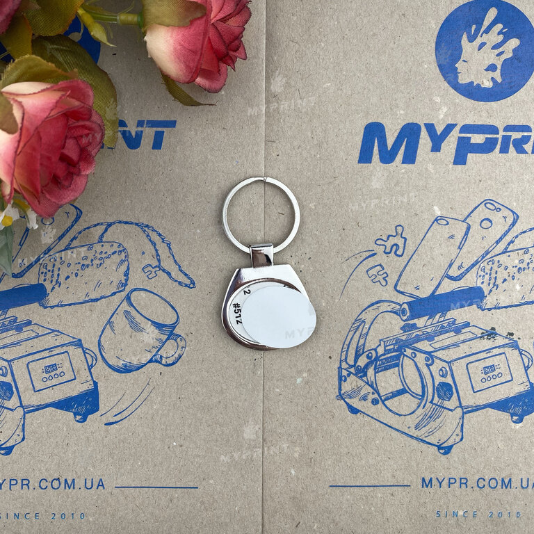 Keychain for sublimation in a gift package metal one-sided oval 30*25 mm (6419)  Keychain for sublimation in a gift package metal one-sided oval 30*25 mm (6419)