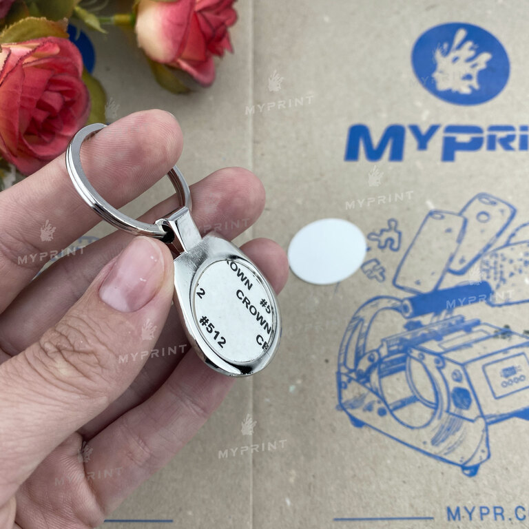 Keychain for sublimation in a gift package metal one-sided oval 30*25 mm (6419)  Keychain for sublimation in a gift package metal one-sided oval 30*25 mm (6419)