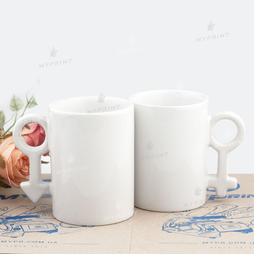 Sublimation cups for couples with a handle in the shape of a sign of a man and a woman (250 ml) (2067) - фото 1 Sublimation cups for couples with a handle in the shape of a sign of a man and a woman (250 ml) (2067) - фото 1 - Blanks for sublimation