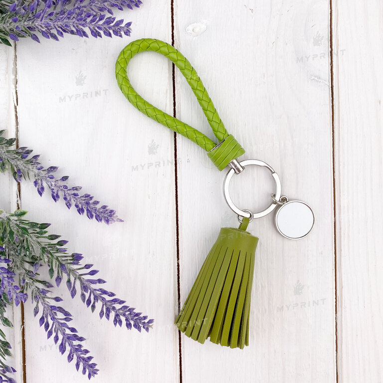 Keychain for sublimation round one-sided with a green cord and tassel d = 20 mm (7541)  Keychain for sublimation round one-sided with a green cord and tassel d = 20 mm (7541)