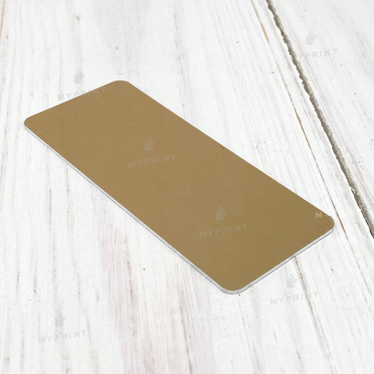 Badge for sublimation metallic rubbed gold 76*31.8*1 mm (8145)  Badge for sublimation metallic rubbed gold 76*31.8*1 mm (8145)